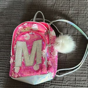 Flippy sequins “M” justice mini backpack